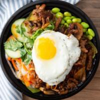 Korean Bbq · Bulgogi beef, sauteed mushrooms, chopped kimchi, pickled daikon and carrots, edamame, sliced...