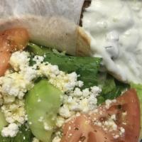 Vegetarian Or Falafel Wrap · Roasted olives, onions, green peppers, lettuce, tomatoes and tzatziki.