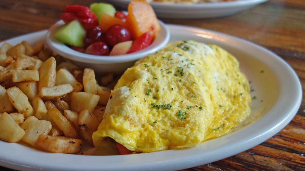 Build Your Own Omelet · 3 egg omelet with any 3 ingredients below: ham, bacon, sausage, Canadian bacon, chorizo, cheese, mushrooms, black beans, black olives, sour cream, onions, spinach, pico de gallo, red or green bell peppers, tomatoes, jalapeños, refried beans, or sautéed peppers & onions.