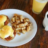 West Texas Egg Benedict · 2 poached eggs with chorizo atop English muffins with hollandaise sauce served with choice o...