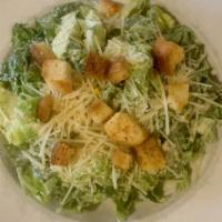 The Caesar · Fresh romaine tossed with our zesty homemade Caesar dressing, croutons and grated parmesan c...