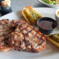 Pork Chops · 2 thick-cut, bone-in  Ozona spiced and charbroiled pork chops served with cranberry relish, ...