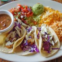 Salmon Or Shrimp Tacos · 3 blackened salmon or shrimp tacos in corn tortillas with cabbage mix; served with guacamole...