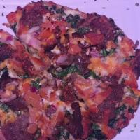 Individual Greek Pizza · Tzatziki, gyro meat, onions, tomatoes, spinach, kalamata olives, mozzarella, and feta cheese...