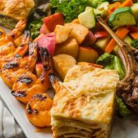 Stratos Specialty Platter · Grilled lamb chops, shrimp scampi, pork souvlaki, moussaka, spanakopita, pastitsio, and dolm...