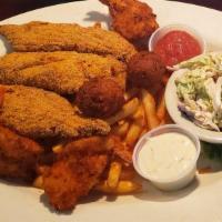 Seafood Platter · Three fried shrimp, three fried oysters, fried catfish filet, two crab balls with French fri...
