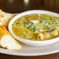 Shrimp & Crawfish Fondue · Saltwater recommends. Shrimp, crawfish and mushrooms in a cream sauce, then baked with peppe...