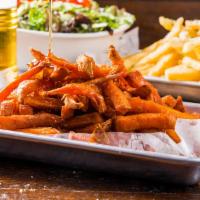 Sweet Potato Fries · Deep fried sweet potato fries served with habanero honey and ketchup.