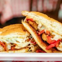 Fajita Chicken Sand · Grilled marinated chicken, grilled onion, red peppers, and topped with melted jack cheese.
