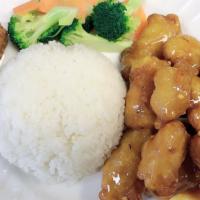 Orange Chicken · Served with Steamed Rice, Deep Fried Breaded Chicken with house
made orange sauce, and a Por...