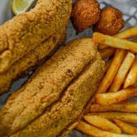 Fish Basket · Hand-battered 4 oz. fish fillets . Served with your choice of one side and two hush puppies....