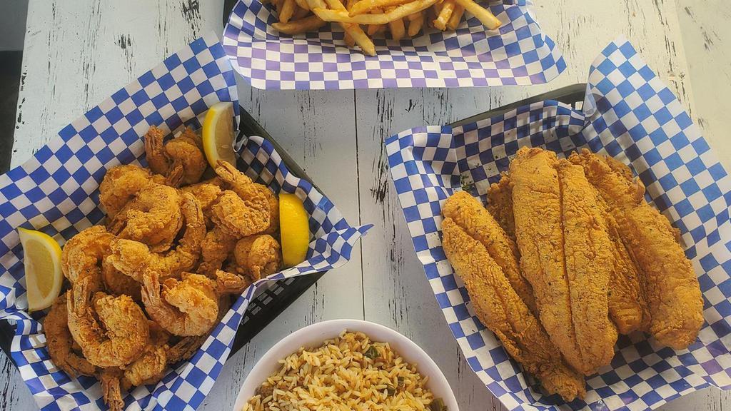Family Combo · 5 Whole Fillets  and 16 pieces of Shrimp  all fried to perfection with your choice of Two (16 oz.)  sides. Feeds 4 to 6 ppl. 
Better Pricing is available for delivery on our site.