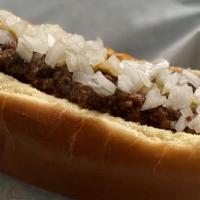 Detroit Style Coney · Koegels vienna coney on a steamed bun, topped with Detroit style chili, onions, and mustard.
