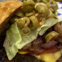 Olive Burger · 1/4 lb patty with olives and served with the works. Cheese, lettuce, mayonnaise, ketchup, mu...