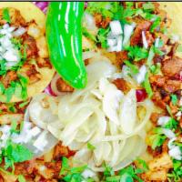 Street Tacos (5) · W/cilantro & onions on double yellow corn beef fajita / barbacoa / cochinita / pastor.