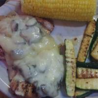 Grilled Chicken Flat Bread · Crispy flour tortilla with our zesty spinach artichoke dip, grilled chicken and parmesan che...