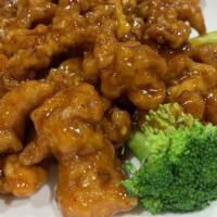 Orange Chicken · Hot and spicy. Served with steamed or fried rice and an egg roll.