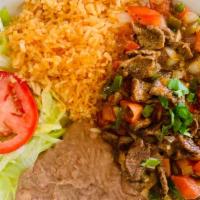 Bistec A La Mexicana / Mexican Steak · Beef steak covered with our special Mexican salsa.