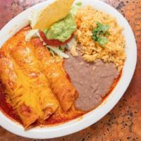 Enchilada Plate · Three enchiladas with your choice of shredded chicken, ground beef or cheese for all three, ...