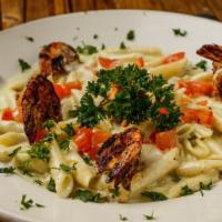 Penne Napolitana W Blackened Shrimp (Spicy) · Penne pasta tossed in spicy Italian pepper cream sauce with fresh tomatoes and blackened shr...