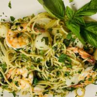 Peppered Shrimp And Scallops Scampi Pasta  · Spaghetti pasta tossed in garlic sauce with peppered shrimp and scallops
Spaghetti pasta tos...