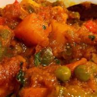 Vegetable Curry · Seasonal vegetable simmered in an old-fashioned semi-spicy curry..... comes with a small ord...