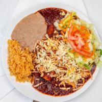 Enchiladas De Pollo / Chicken Enchiladas · Incluye arroz y frijoles. / Includes rice and beans.