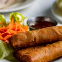 Eggroll (Chả Giò) · Three egg rolls stuffed with pork and vegetables served with fish sauce.