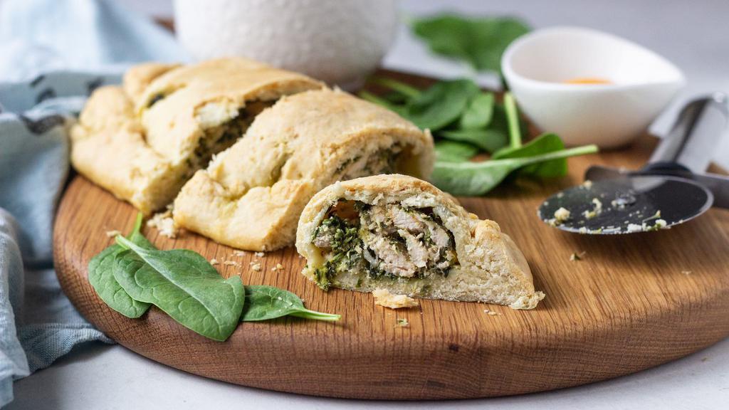 Chicken, Spinach & Tomatoes Calzone  · Grilled chicken slices, spinach and diced tomatoes inside chef's famous calzone.