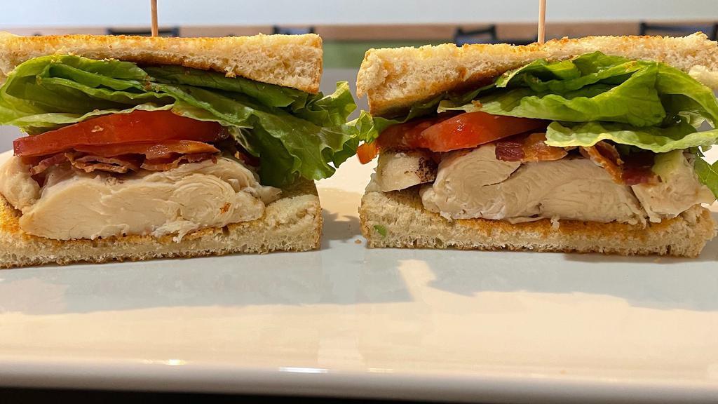 Matt Grilled Chicken Sandwich · Grilled chicken breast, bacon, green leaf lettuce, tomato, mayo, toasted sourdough bread.