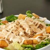 Chicken Caesar Salad · Chicken breast, Parmesan cheese, croutons and romaine lettuce served with peppery Parmesan C...