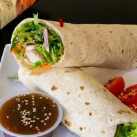 Oriental Wrap · Tomato basil wrap. Chicken breast, mixed greens, carrots, tomatoes, red onions, cucumbers, q...
