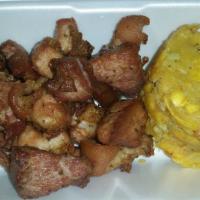 Mofongo With Carne · Delicious mashed fried green plantain with garlic.
