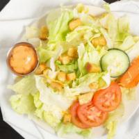Garden Salad · Vegetarian. Lettuce, tomatoes, carrot, cucumber, red onions, and cheddar cheese. Served with...