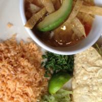 The Tootsie Plate · Our delicious chicken tortilla soup, with cheese, avocado, one chicken taco and guacamole sa...