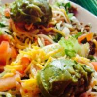 Nachos (1/2 Order) · Gluten free. Tex-mex beans or black beans, cheese, tomatoes, sour cream, guacamole and jalap...