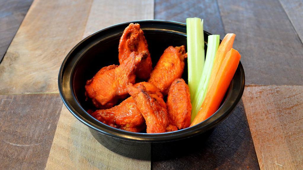 Classic Wings - Small · Tossed in your choice of sauce served with celery, carrots and a side of ranch or bleu cheese dressing.
