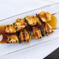 Yakitori (2 Pieces) · Grilled chicken skewers served with teriyaki sauce.