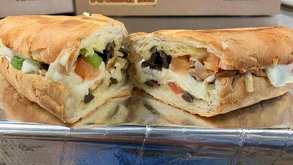 Garlic Veggie Sub (Regular) · Served toasted with Mozzarella, Green Pepper, Onion, Tomato, Black Olive, Mushroom and buttery flavored Garlic sauce