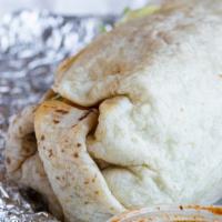 Burrito · A large flour tortilla filled with your choice of meat, rice, pinto beans, lettuce, pico de ...
