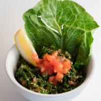 Tabbouleh · A salad made with finely chopped parsley mint bulgur and onion seasoned with olive oil lemon...