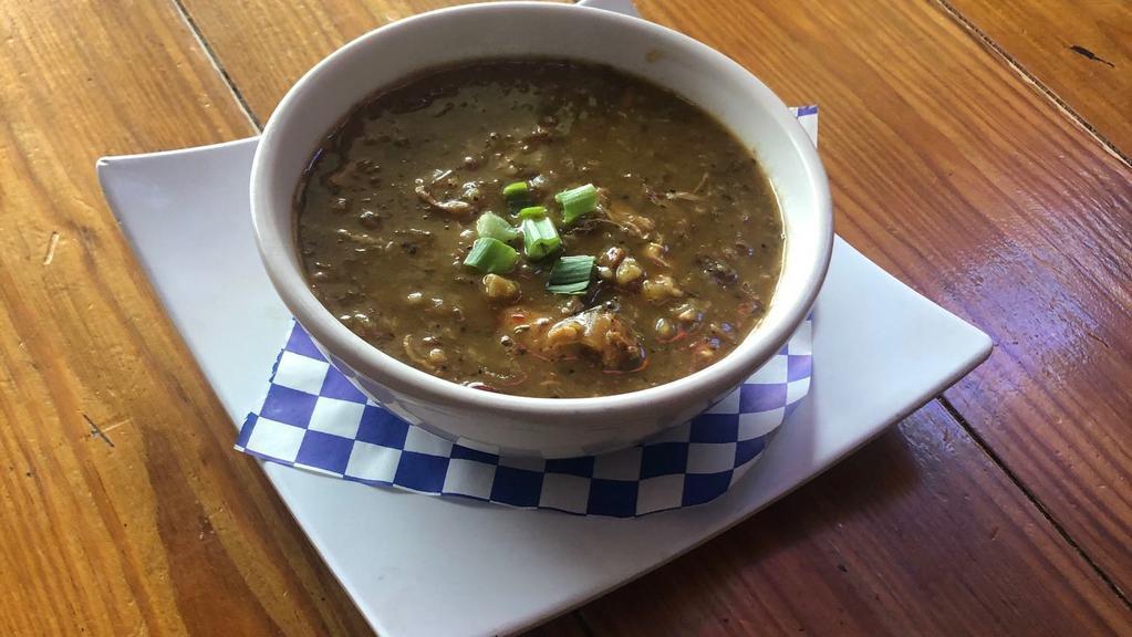 Seafood Gumbo · Light roux gumbo with smoked andouille sausage, chicken, shrimp, and okra served with rice.