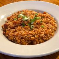 Jambalaya Rice · Rice cooked with smoked andouille sausage, chicken and shrimp.