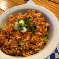 Jambalaya Rice · Rice cooked with smoked andouille sausage chicken and shrimp.