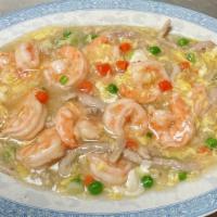 Shrimp In Lobster Sauce · Tender shrimp, peas and carrots simmered in lobster sauce with a touch of minced pork, scall...
