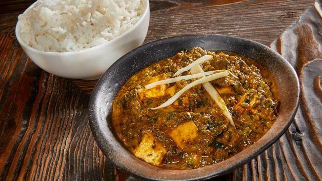 Saag Paneer · Gluten-free. Spicy. Cubed paneer, spinach puree, onion, tomato.