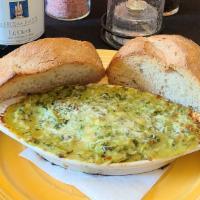 Spinach Artichoke Dip · Brick Oven Baked- spinach, artichokes, cheeses, and roasted garlic- served with house-made b...
