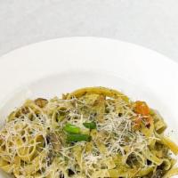 Basil Pesto Fettuccine · Basil pesto cream sauce, mushroom, tomato, garlic, and parmesan