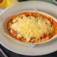 Classic Lasagna · Brick Oven Baked - with beef, and sausage, marinara, ricotta and mozzerella cheeses