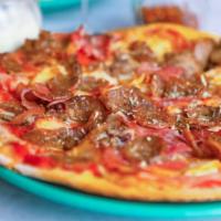 The Carnivore · Tomato sauce, sausage, pepperoni, ham, beef, and mozzarella